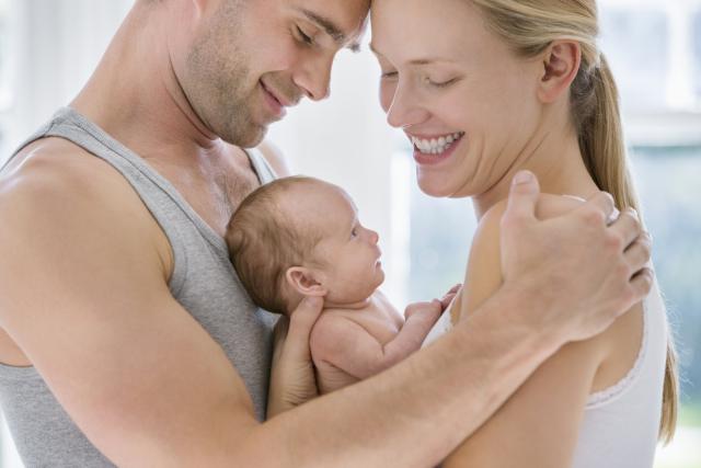 couple-with-newborn-baby-caiaimages.jpg